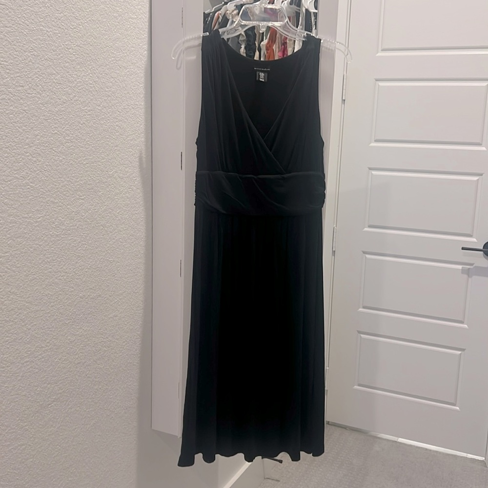 Fit and flare belted black knit dress
